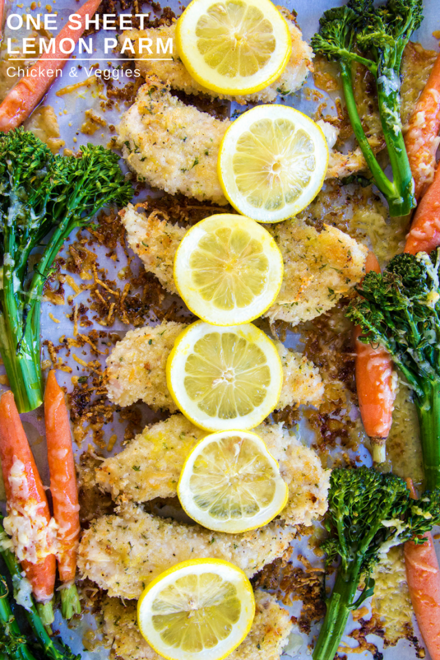 One Sheet Pan Lemon Parmesan Chicken & Vegetables Recipe - Lemon parmesan chicken, covered a light panko crust and roasted vegetables. The best part? It's made on one sheet pan.