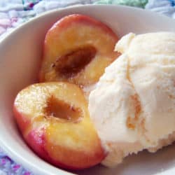 Roasting peaches in the oven brings out a delicious flavor that is perfect for a light summer dessert to pair with ice cream.
