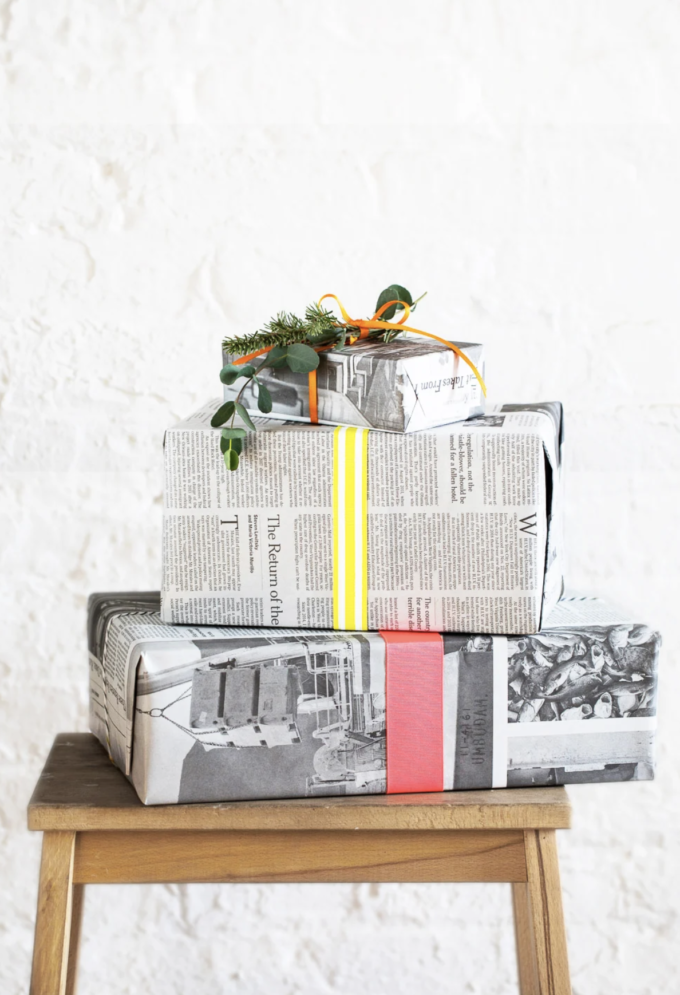 Newspaper Wrapping Paper with Ribbon and Greenery
