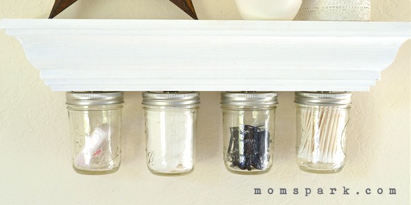 This magnetic mason jar storage shelf is simple to make, incredibly functional and super cute to boot! Full tutorial.