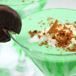 Green Peppermint Patty Cocktail Drink Recipe! I am a big believer in having a cocktail (or mocktail for the non-drinkers) for every holiday. Because it's fun and special. And it gives me a good reason to be creative. So, for St. Patrick's Day coming up, I thought, "Why not put a Peppermint Patty into a drink?" So, it happened.