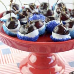 Red, White & Blue Boozy Cherry Bombs Recipe for July 4th! It involves cherries soaked in vodka, friends.