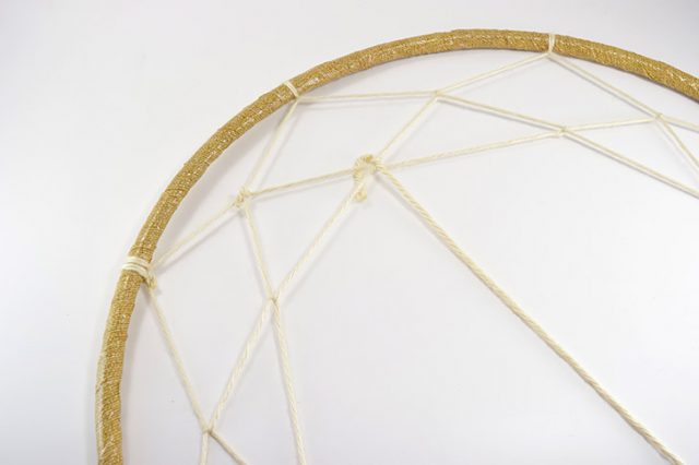 Make a GIANT dreamcatcher out of a hula hoop. How fun is this? Perfect for a statement wall!