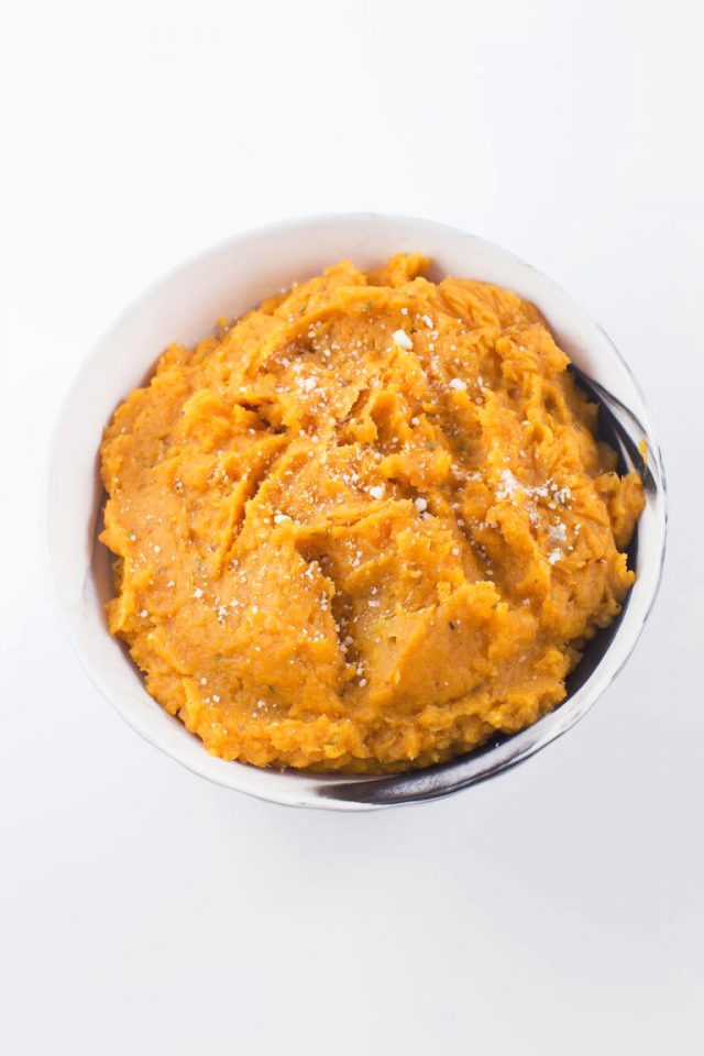 A buttery and cheesy mashed sweet potato side dish recipe made in a pressure cooker that is absolutely perfect for Thanksgiving, Christmas or any holiday meal. Loaded with herbs and garlic, this mash is packed full of flavor and depth. Instant Pot or Multi-cooker.